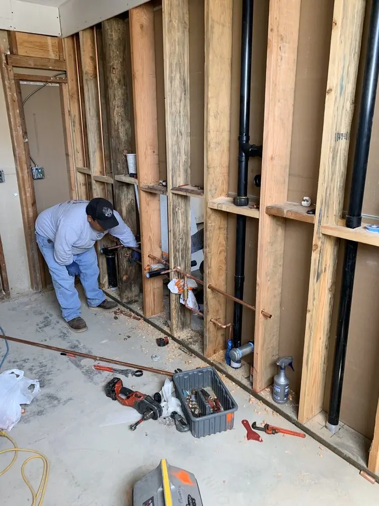Commercial rough-in plumbing for Water Heater Replacement in Roslyn Heights
